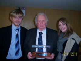 Haydn Griffiths being presented with the award